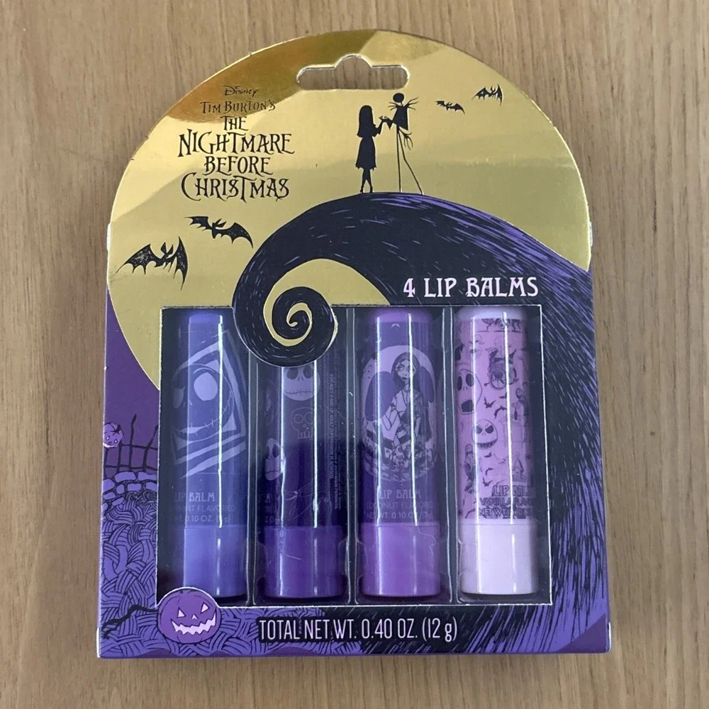 Disney THE NIGHTMARE BEFORE CHRISTMAS- 4 Flavored Lip Balm Set - New In Box